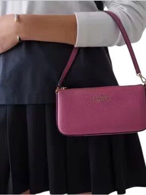 Kate Spade New York
JULIETTE CONVERTIBLE WRISTLET. New